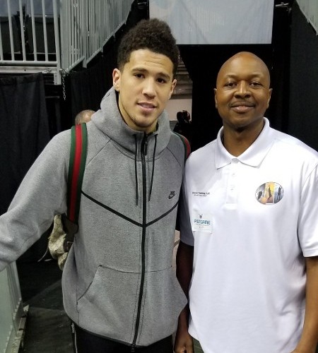 Devin Booker of the Phoenix Suns and Hasan Ahad